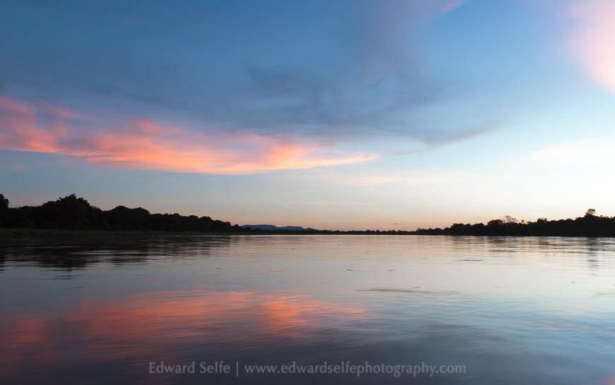 Boating along the Luangwa River at sunset in the South Luangwa National Park
