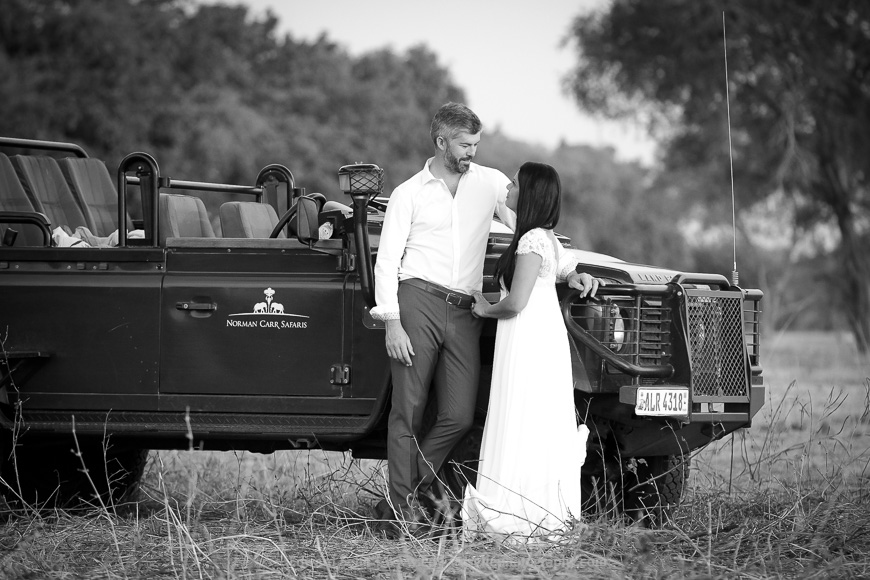 A newly-married couple share a moment on safari in South Luangwa.